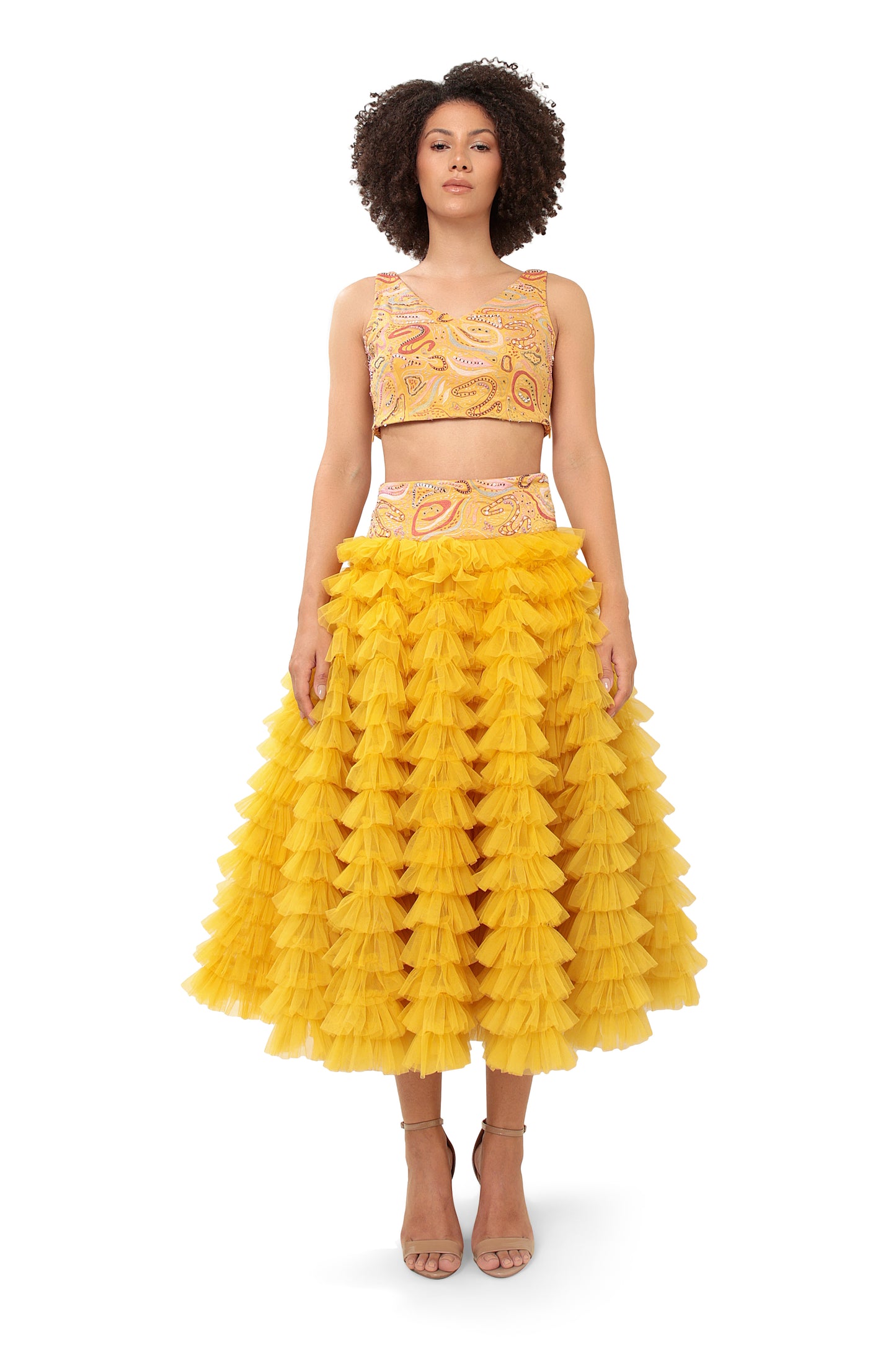 Modo Caldo yellow ruffled net lehenga and hand embellished crop top for mehendi haldi festive wear