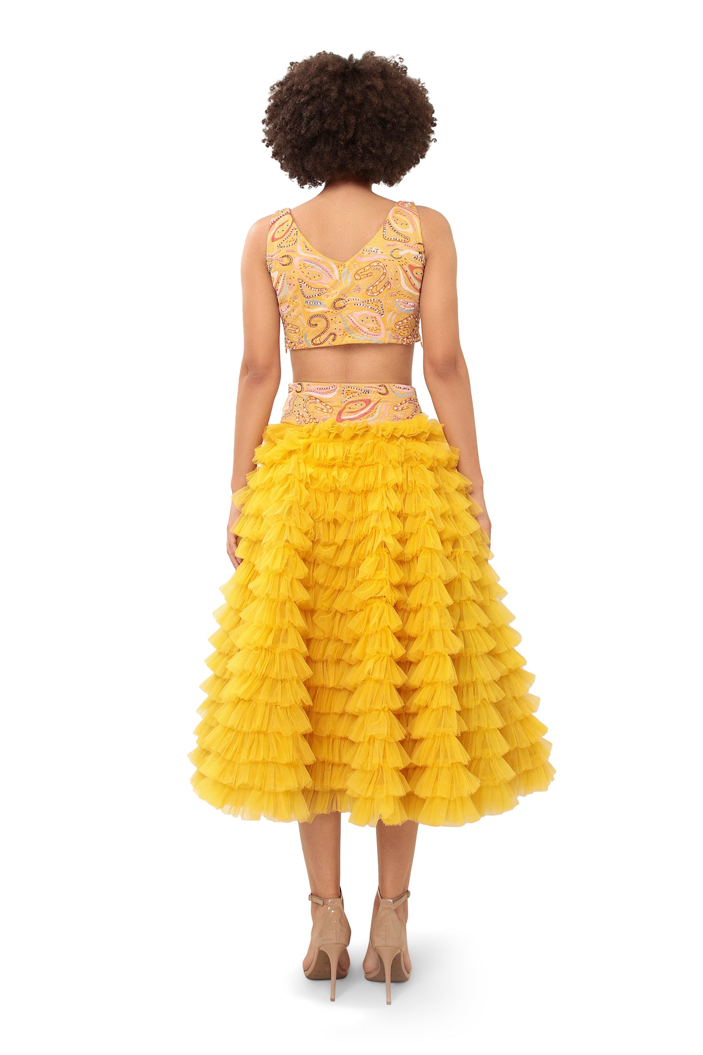 Modo Caldo yellow ruffled net lehenga and hand embellished crop top for mehendi haldi festive wear