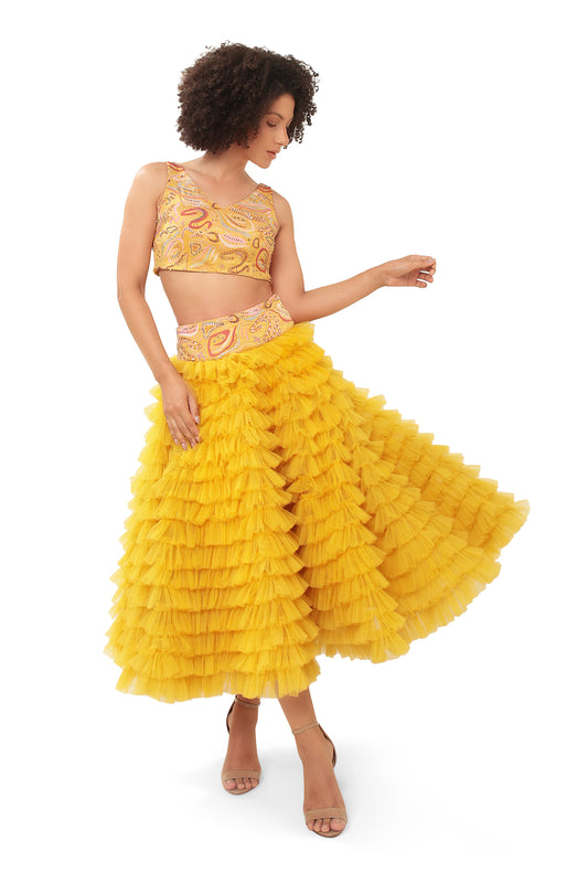 Modo Caldo yellow ruffled net lehenga and hand embellished crop top for mehendi haldi festive wear