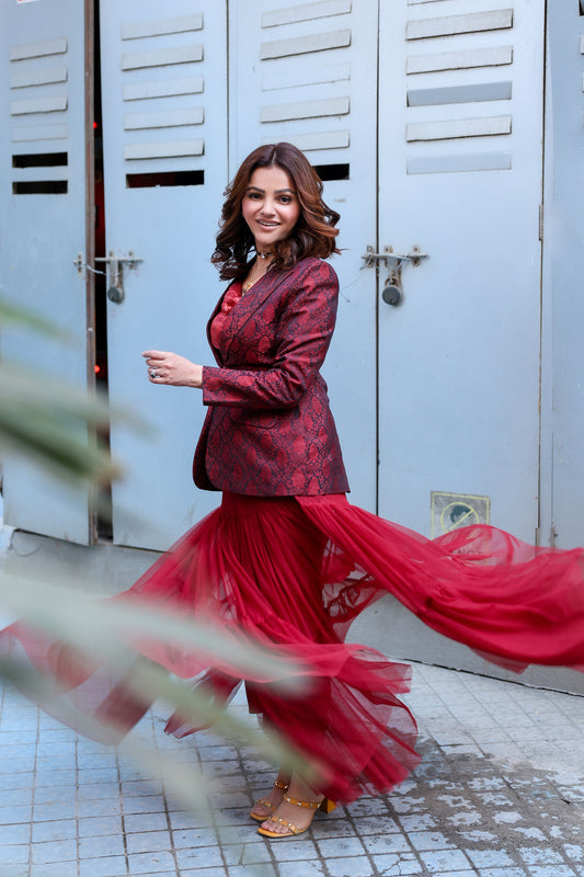 Rubina Dilaik in Modo Caldo red hourglass blazer with sheer A-line tulle skirt styled for formal and pageant occasions