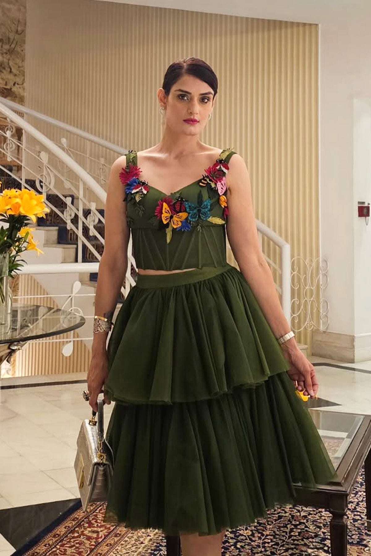 Avantika Tokas Midha in Modo Caldo green corset top with quirky embellishments and two-tiered tulle skirt for festive and casual wear