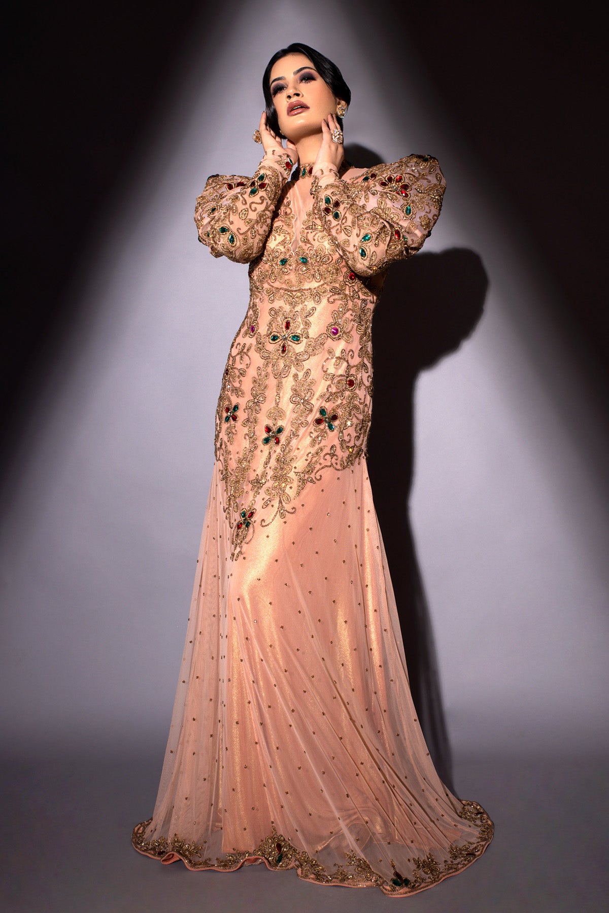 Pageant Mentor Preeti Vashishth in Modo Caldo rose gold fit and flare mermaid gown with floral zardosi embroidery deep plunge neckline and puffed sleeves