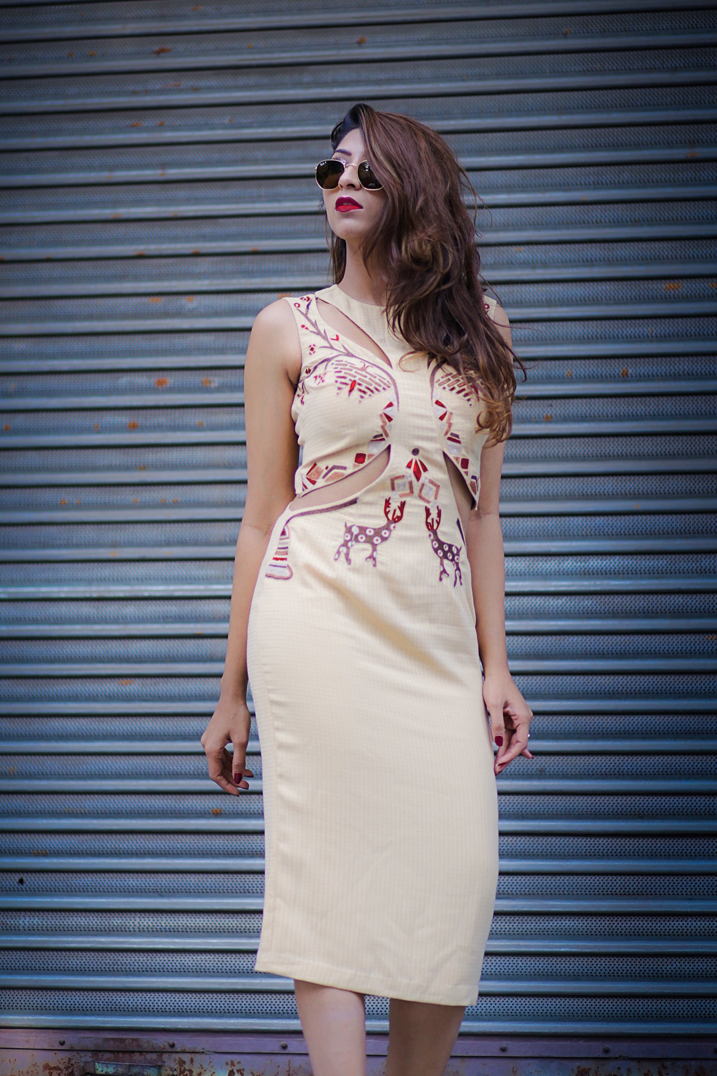 Malvika Gupta in Modo Caldo sleeveless beige midi calf length bodycon dress with cut outs quirky metallic thread embroidery for casual and party wear