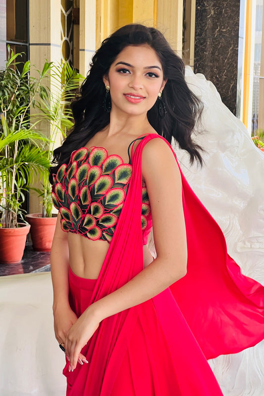 Anwita Sundaram in Modo Caldo red contoured peacock blouse with matching drape saree styled for Miss Teen Diva
