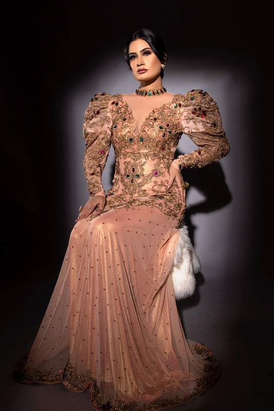 Pageant Mentor Preeti Vashishth in Modo Caldo rose gold fit and flare mermaid gown with floral zardosi embroidery deep plunge neckline and puffed sleeves