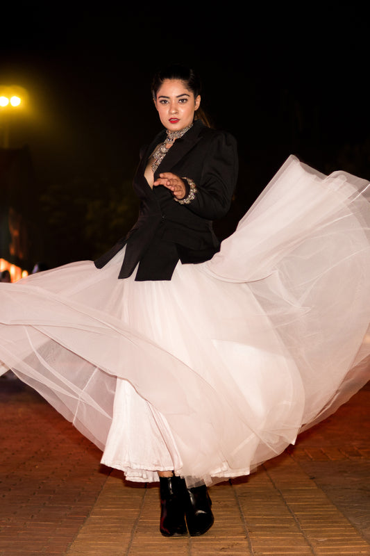 Rose Kawatra in Modo Caldo black backless hourglass blazer with white flared tulle skirt elegant set for formal and evening occasions