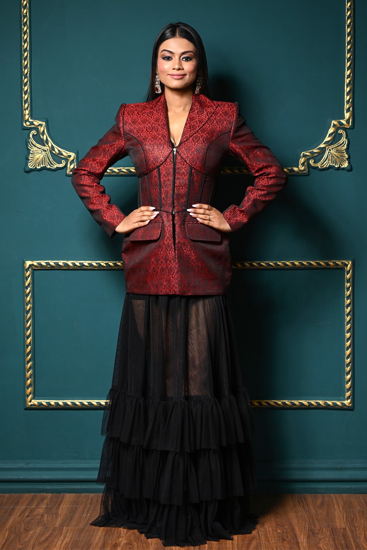 Monalisa Hazarika in Modo Caldo red hourglass blazer with black sheer mermaid skirt, styled for Mrs. World International.