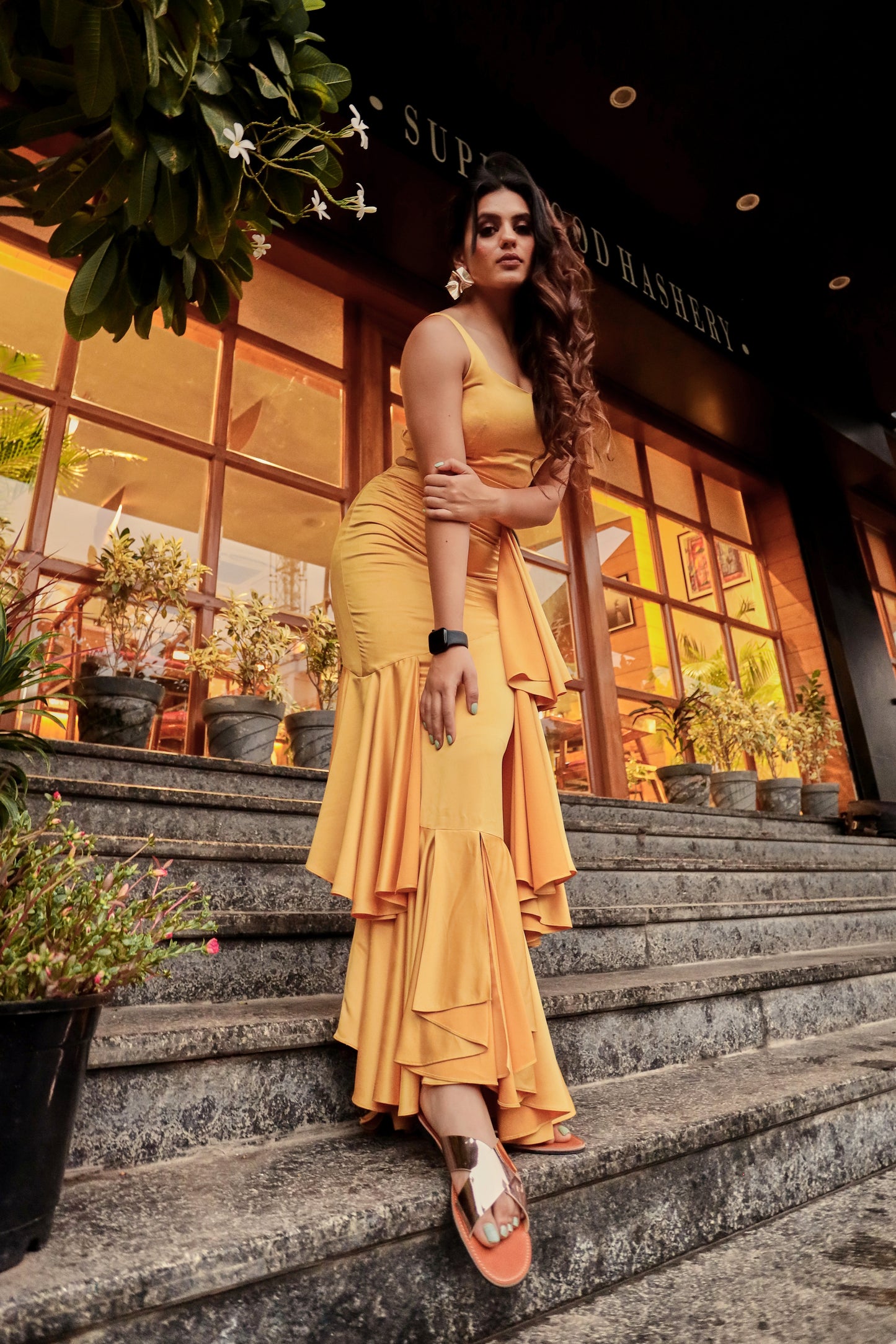 Arushi Handa in Modo Caldo yellow bodycon evening dress with sweetheart neckline and ruffles