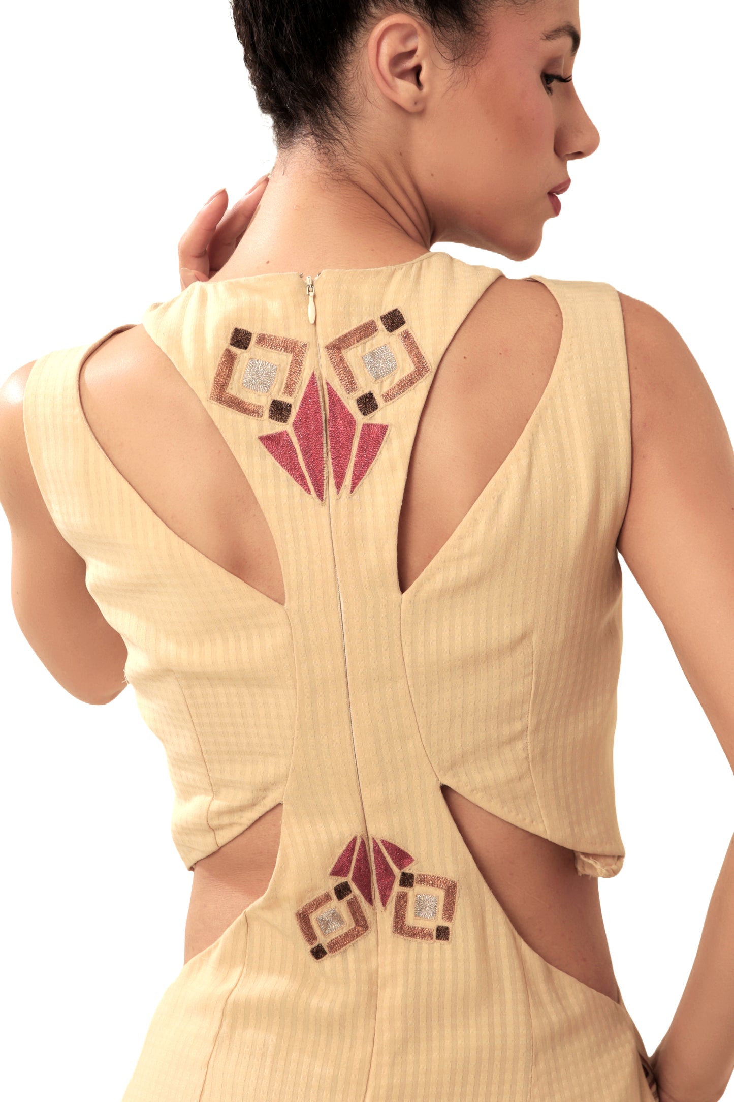 Modo Caldo beige sleeveless bodycon gown with quirky design metallic embroidery and cut-outs with round neck for evening and casual wear
