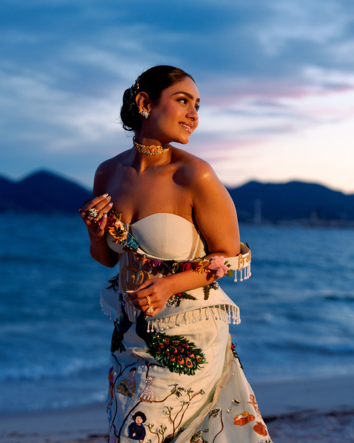 Pavitra Kaur in mint green strapless Natkhat Zindagi corset gown by the sea at Cannes