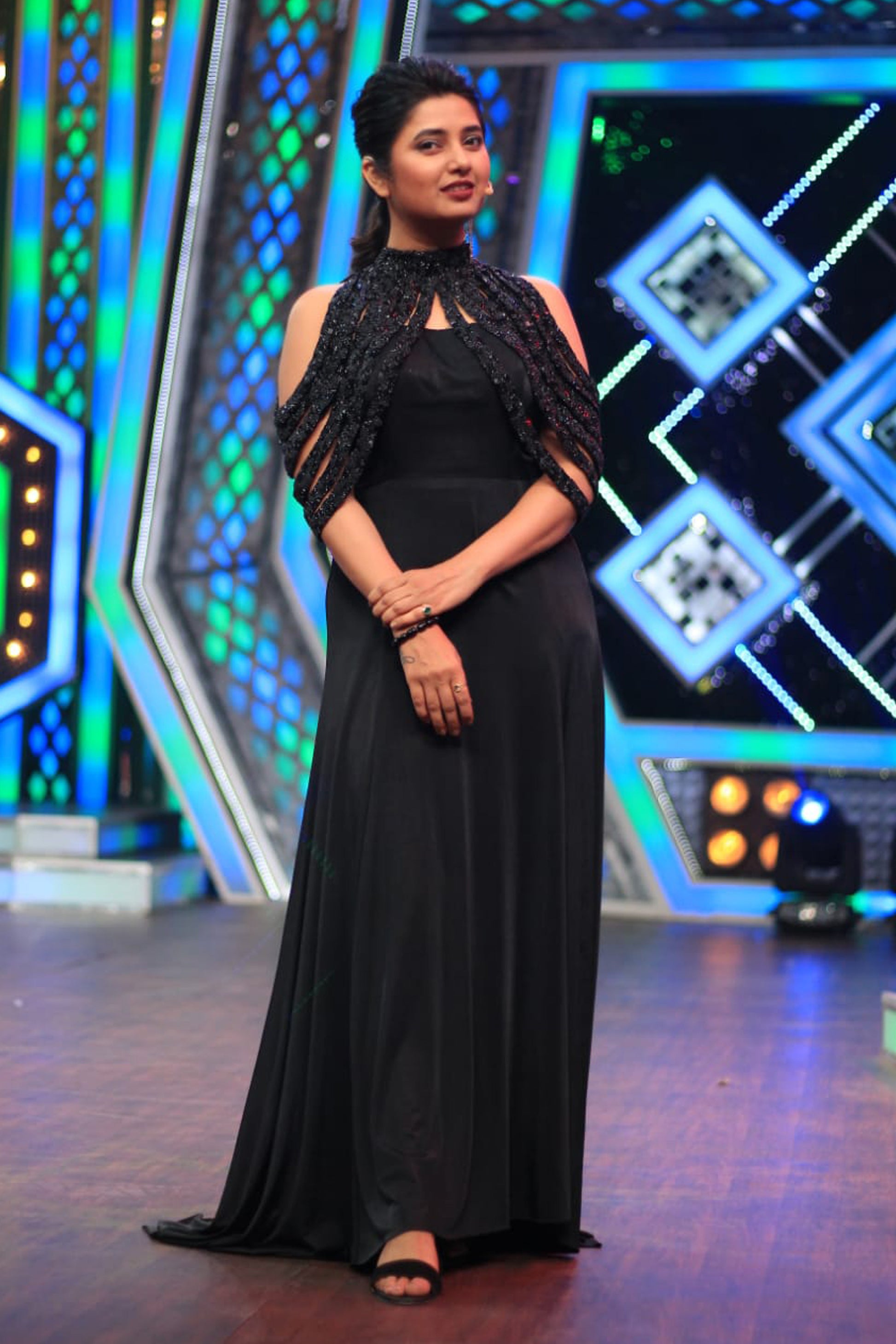 Prajakkta Mali in Modo Caldo black A-line maxi dress with embroidered cape styled for formal occasions