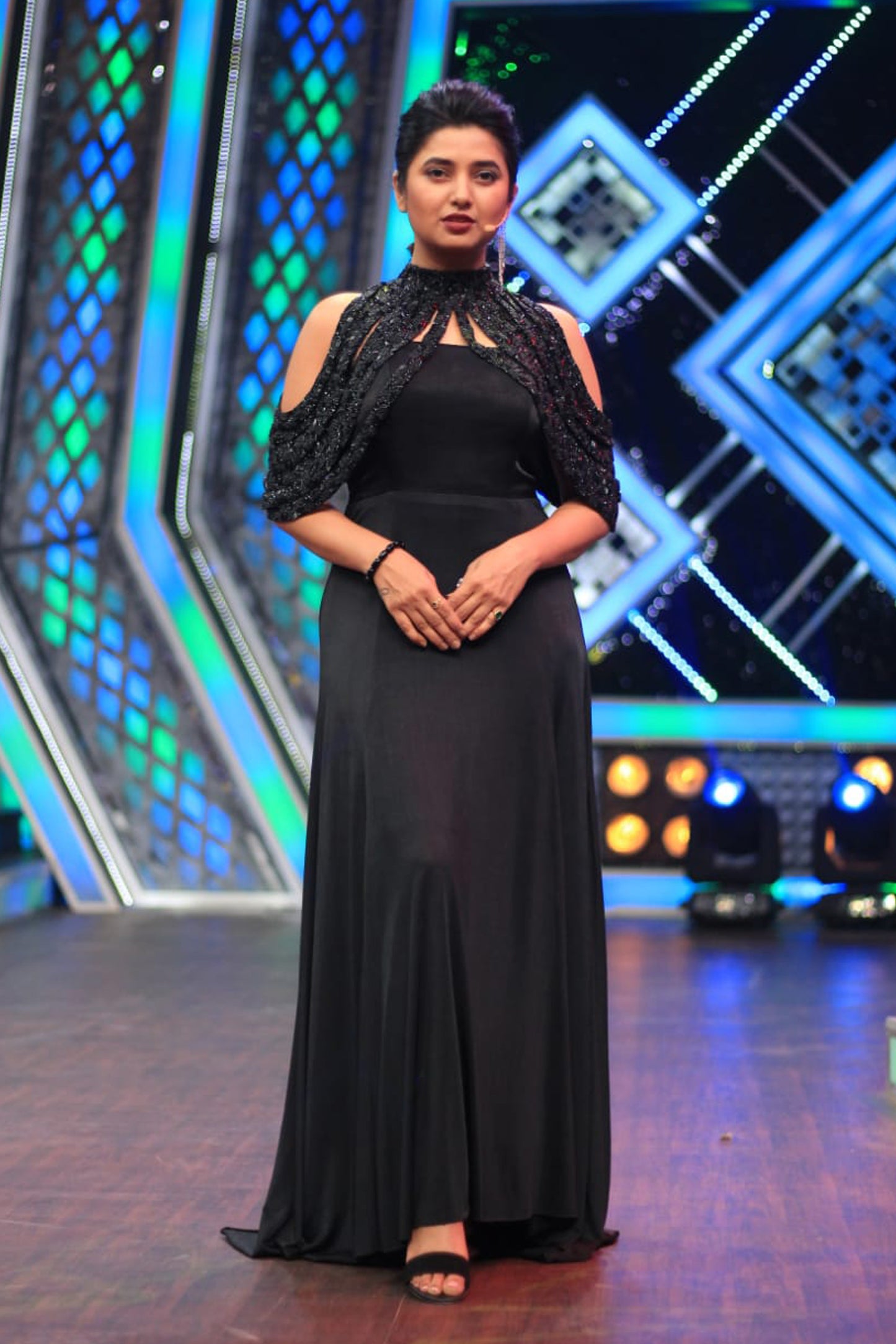 Prajakkta Mali in Modo Caldo black A-line maxi dress with embroidered cape styled for formal occasions