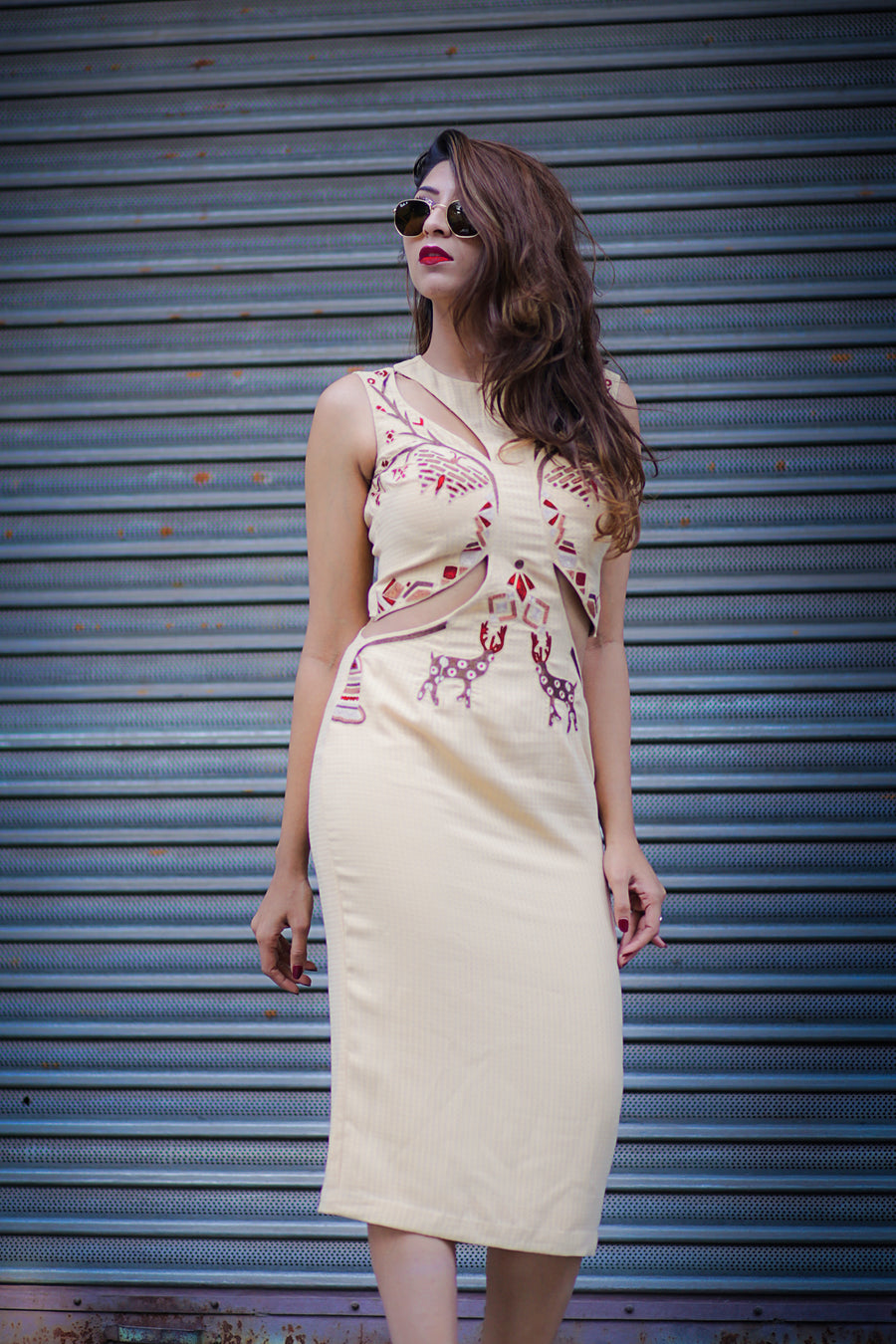 Malvika Gupta in Modo Caldo sleeveless beige midi calf length bodycon dress with cut outs quirky metallic thread embroidery for casual and party wear