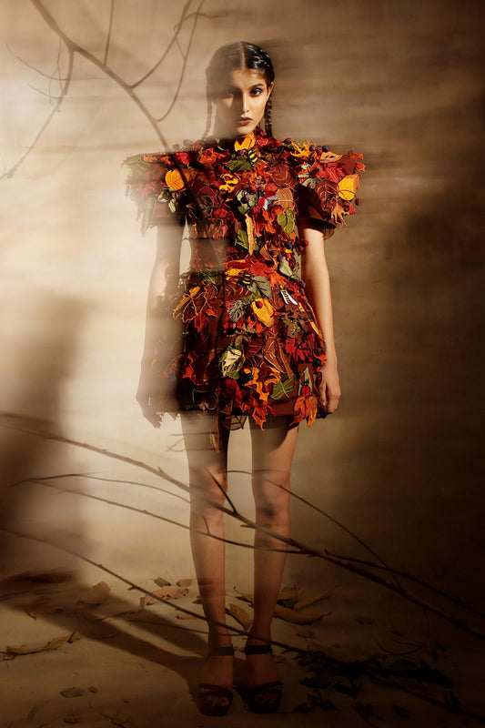 Short bell shaped dress covered in appliqued autumn leaves and berries