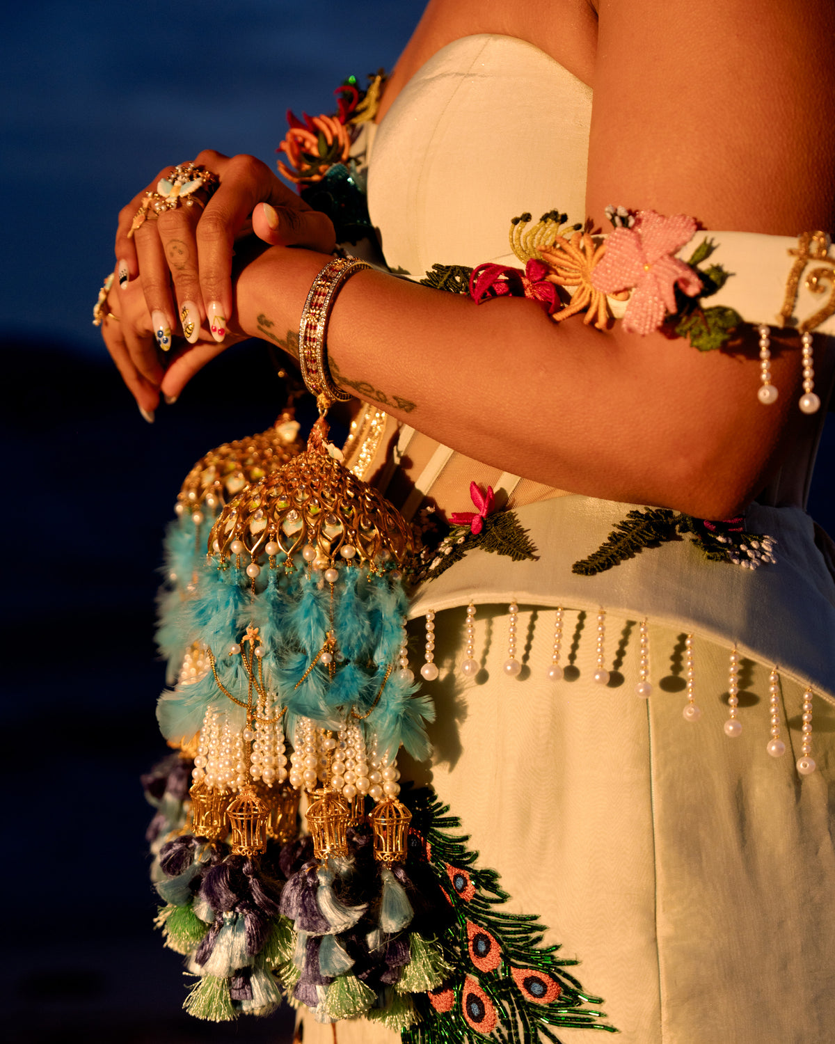 Close-up of the embroidered tassel cuff and fringed corset waist of Natkhat Zindagi